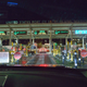 1/125 seconds, f/4.0, ISO 6400. Surprisingly low noise.